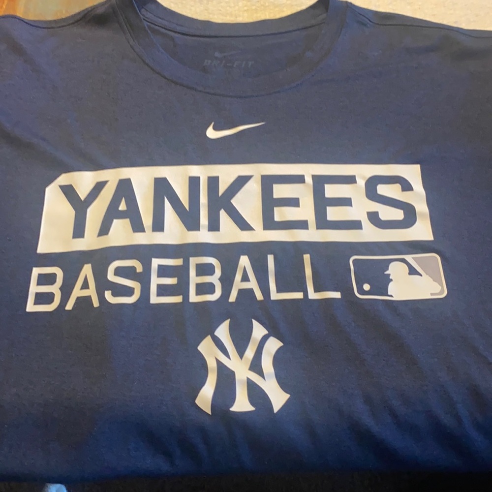 Nike blue New York Yankee’s Dri-fit shirt, short sleeve used.